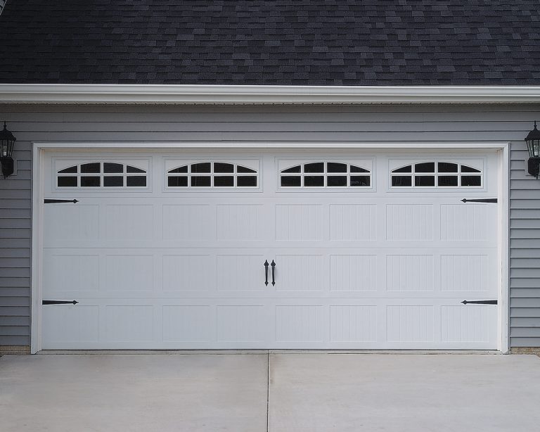 Raynor Carriage House Garage Doors with Stockton Arch Glass • ♦ All ...