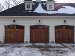 Wood Style Accufinish Carriage House Garage Doors with Arched Stockton Ranch Glass